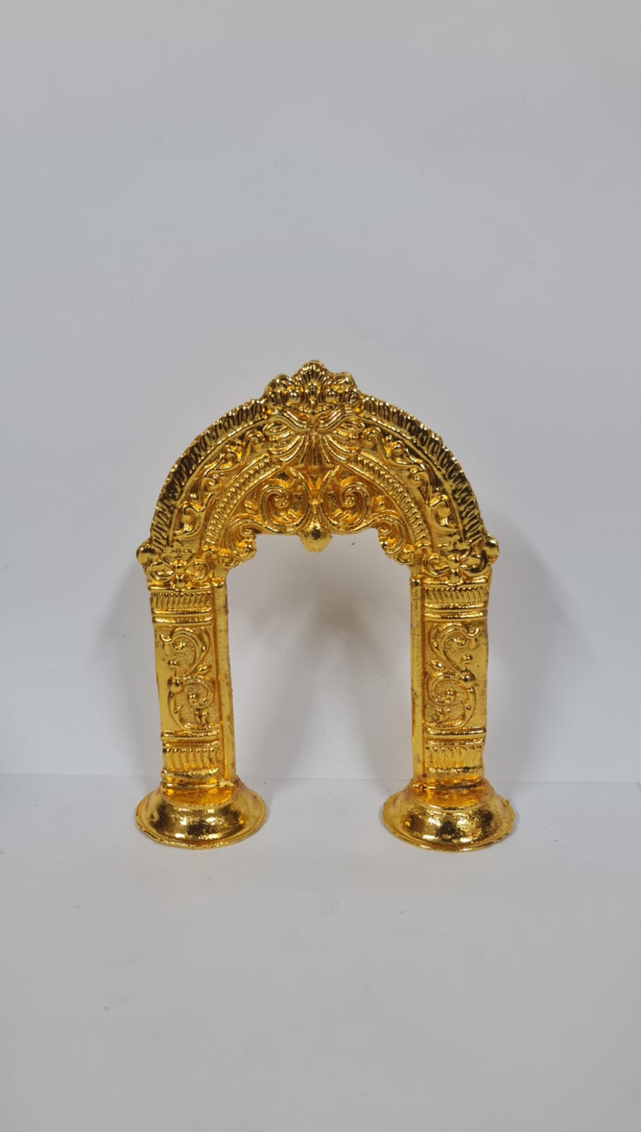 BRASS TIRUVACHI OR PRABHAVALI WITH ROUND BASE